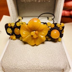 Beautifully hand carved flower jade bracelet